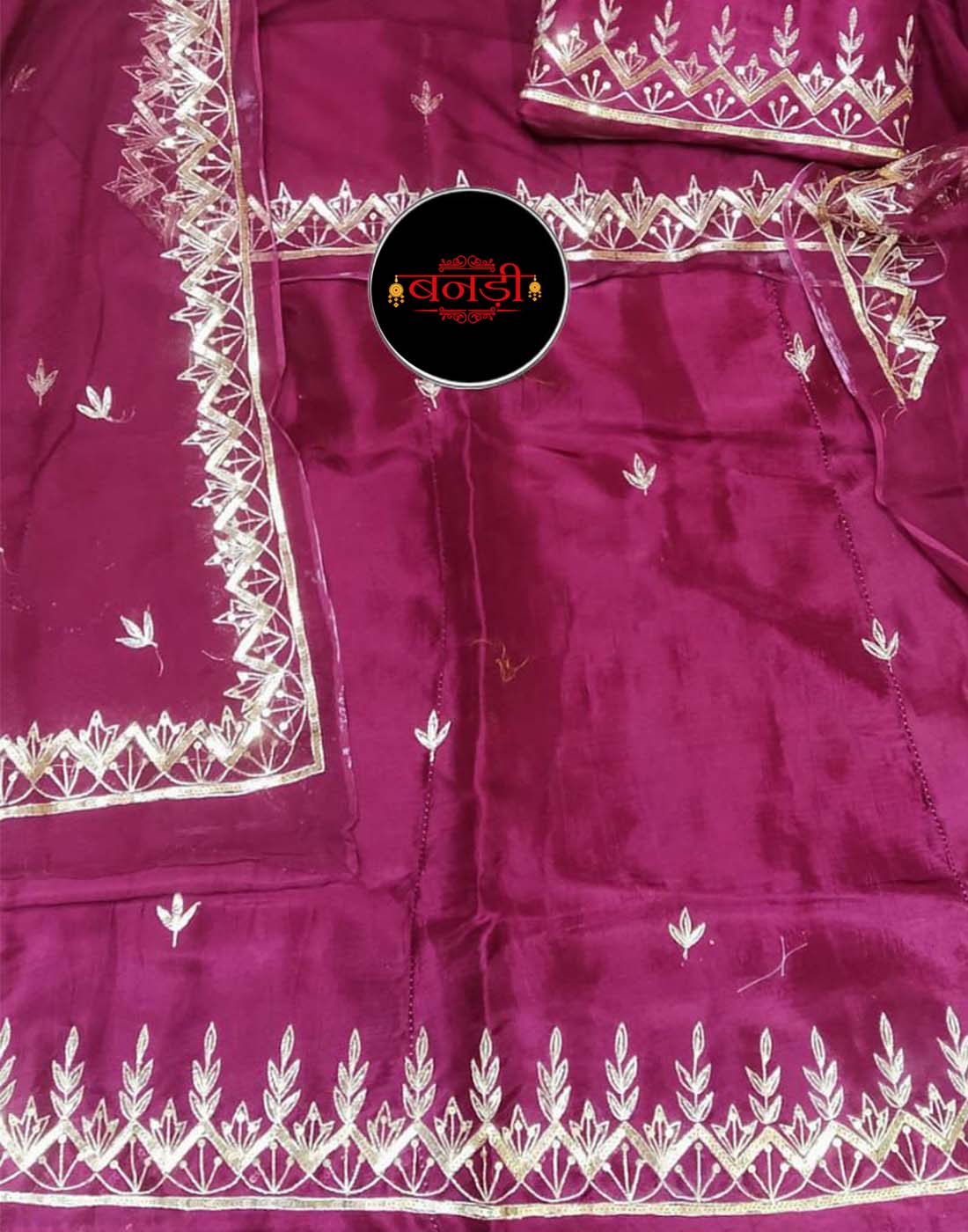 Upada Suit in Dark Rani Color with Jodhpur Tikli Mix Handwork